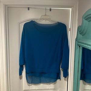 Ann Taylor woman’s blue sweater. Size medium.